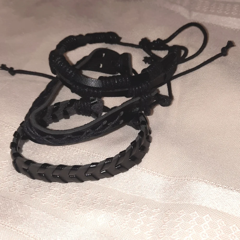 3 black bracelets